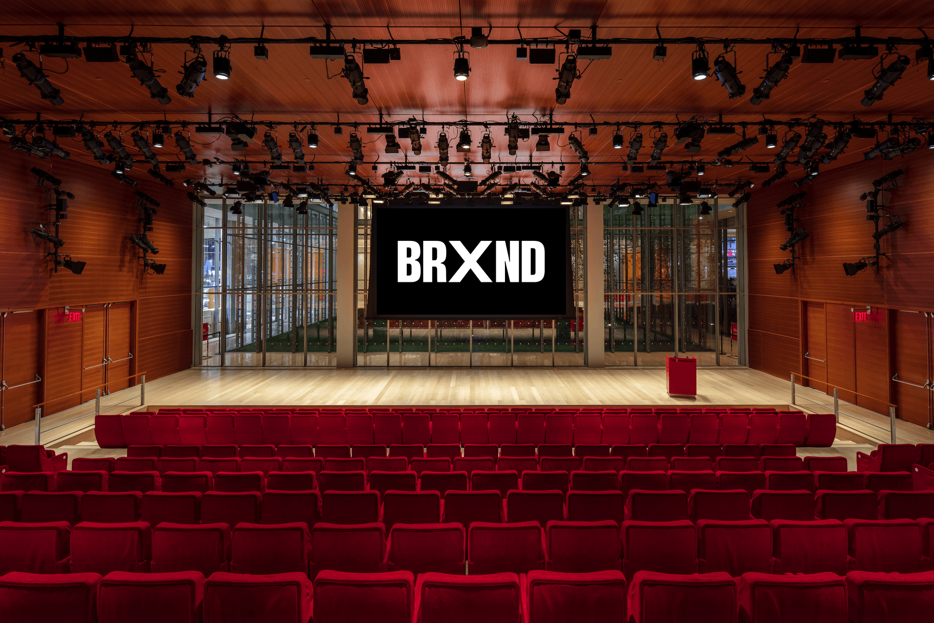 The Times Center auditorium with the BRXND wordmark on stage