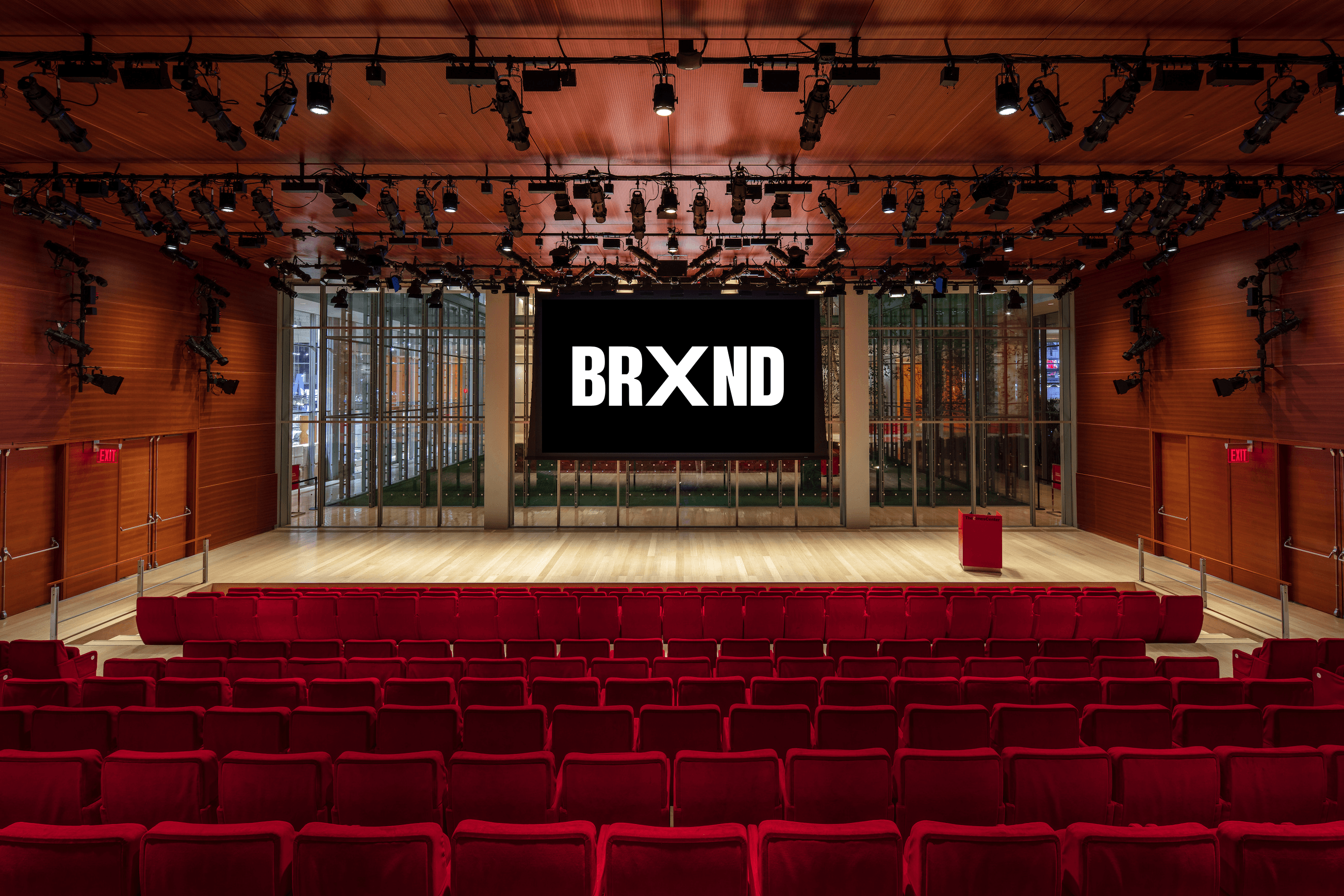 The Times Center auditorium with the BRXND wordmark on stage